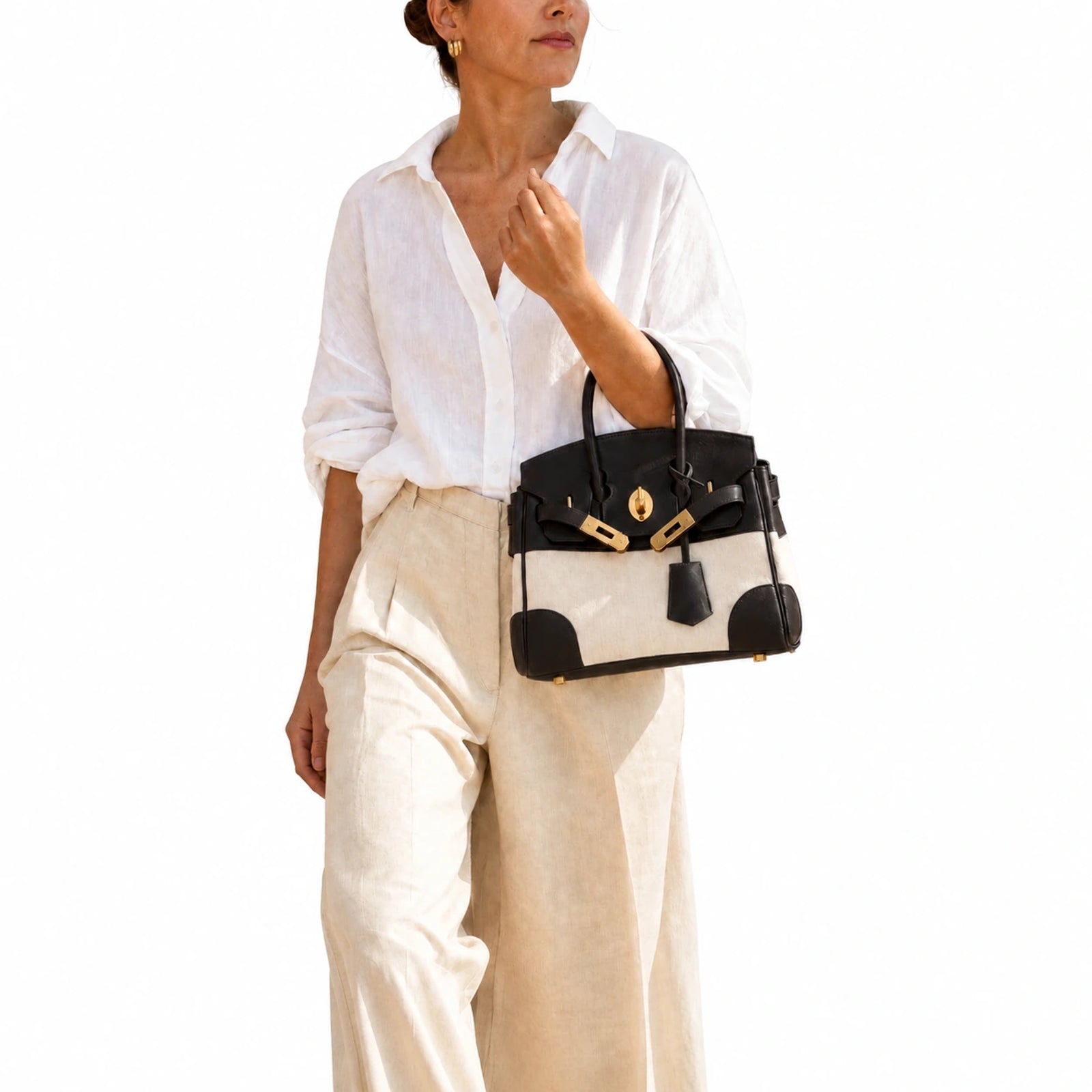 Velantra Delphine in Dark Chocolate, carried in the crook of the arm