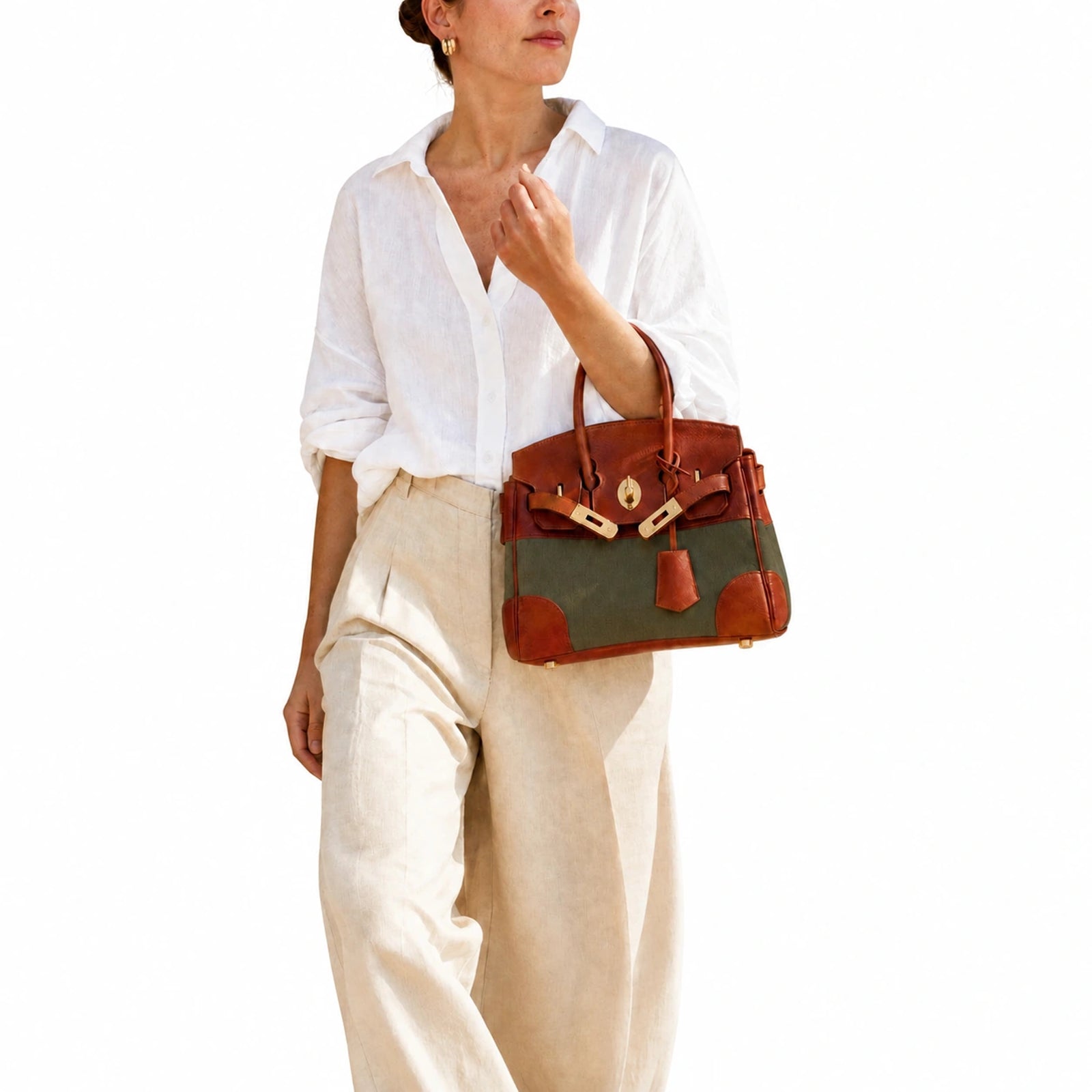 Velantra Delphine in Army Green, carried in the crook of the arm