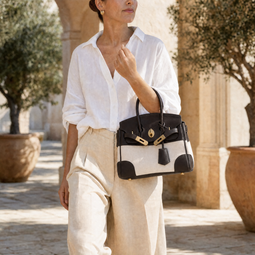 Velantra Delphine in Dark Chocolate, carried in the crook of the arm