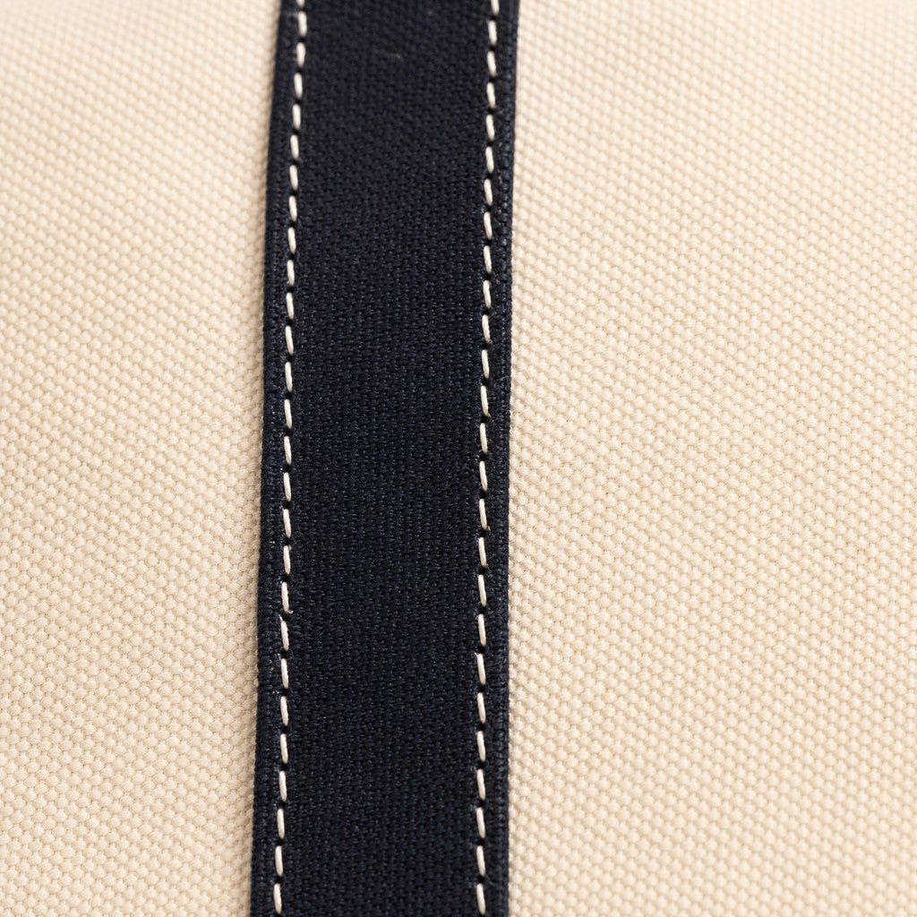 Close-up of the Camille’s Navy front strip and contrasting edge stitching.