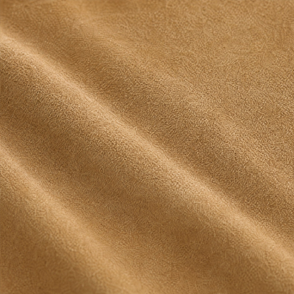 Close-up of the Juliette Camel suede nap and soft natural folds.